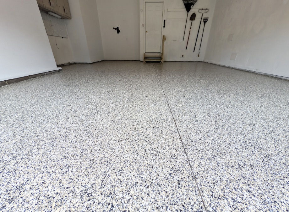 Black and white flake epoxy two-car garage floor in Cuyahoga Falls, Ohio